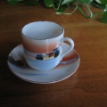A teacup, with a house on it and sent by Cathy Sandy, was waiting for me when I return