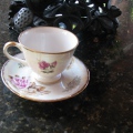 114 is a mended teacup from my sister Heather. A strong wind knocked it from a sill and broke it in half.